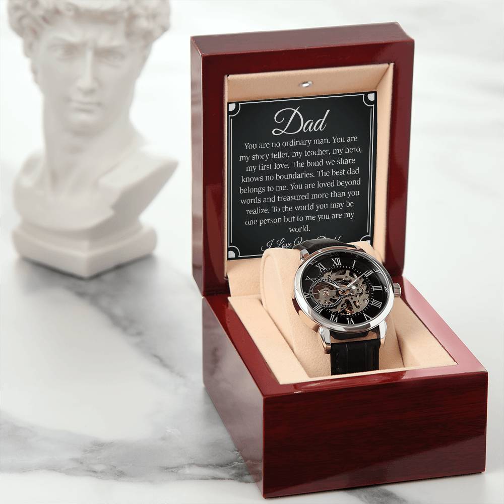 Men's openwork watch in elegant box with "Gift for Dad" message card, featuring a skeleton dial and leather strap on marble surface.