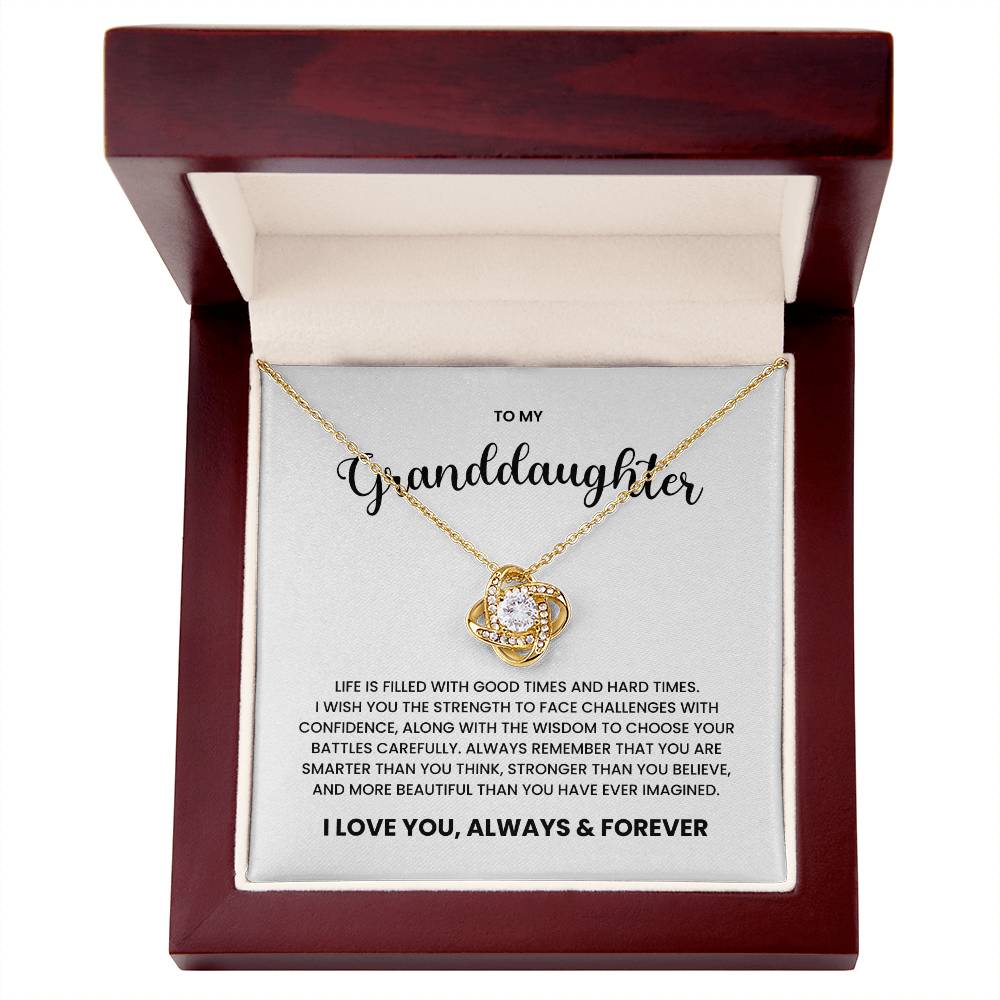 Love Knot Necklace in gift box with heartfelt message to granddaughter, featuring premium cubic zirconia on 18k gold over stainless steel.