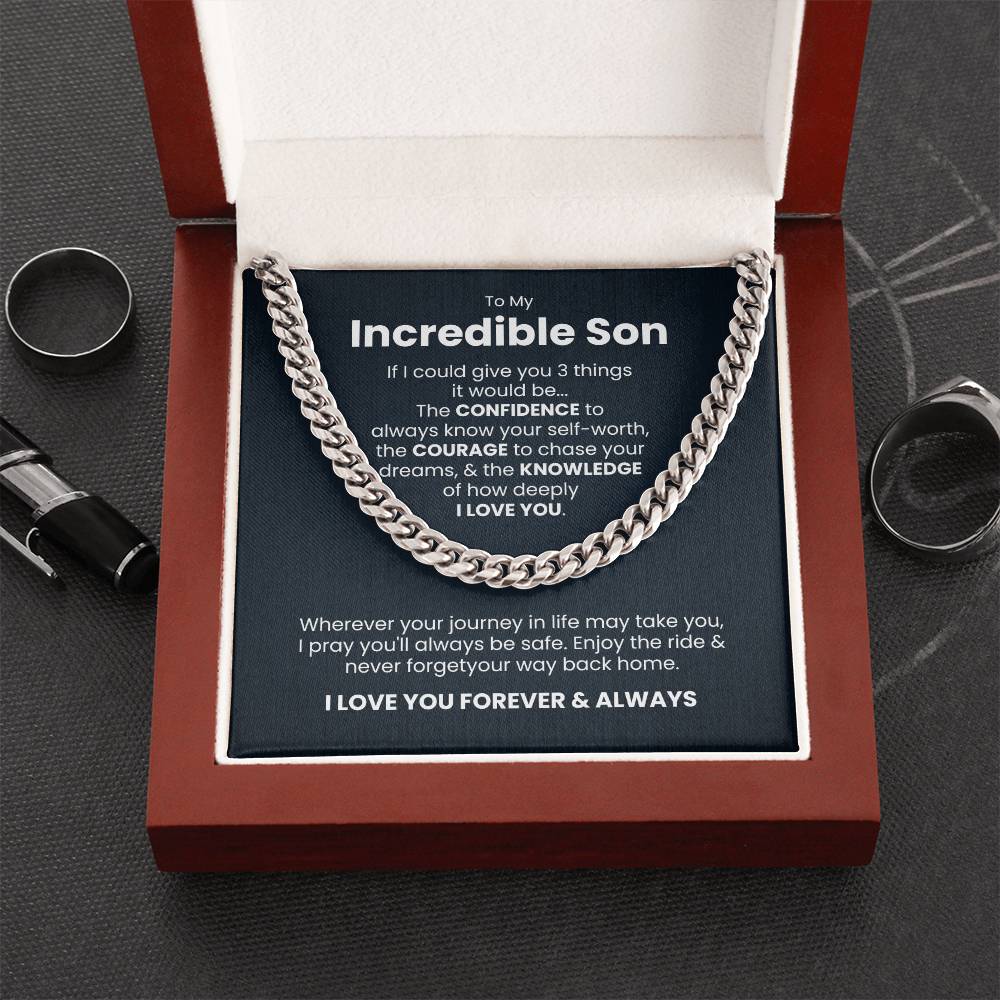 Polished stainless steel Cuban link chain in red gift box with message card for son, expressing love and encouragement.
