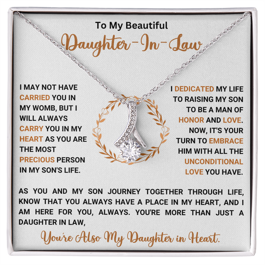 Alluring Beauty necklace for daughter-in-law with heartfelt message card, silver ribbon pendant, perfect sentimental gift for her.