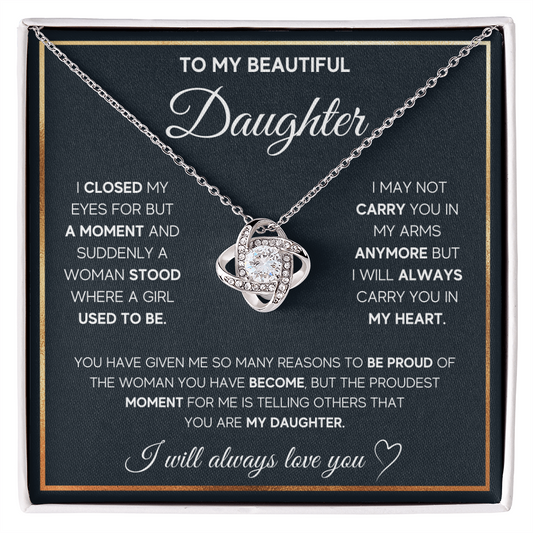 Love Knot Necklace for Daughter with heartfelt message, symbolizes unbreakable bond; perfect gift showcasing love and pride.