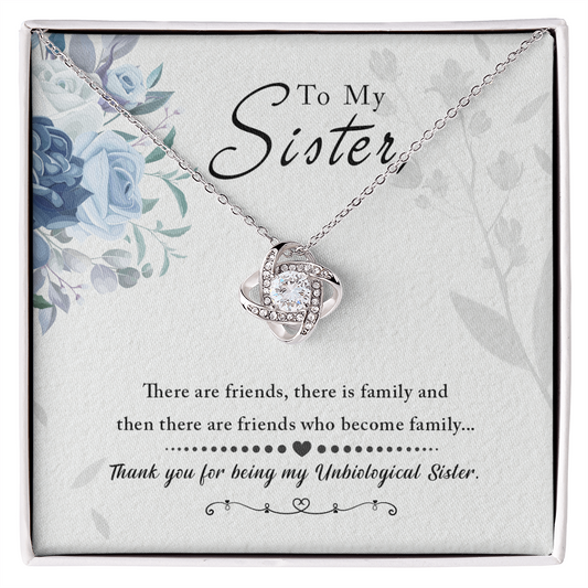 Love Knot Necklace with cubic zirconia crystals, gift for sister, featuring unbreakable bond message in decorative box with floral design.