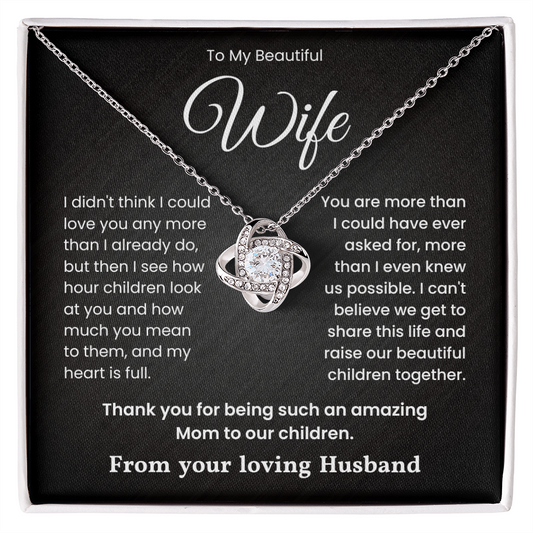 Love Knot Necklace with heartfelt message for wife, featuring cubic zirconia crystals on a 14k white gold over stainless steel pendant.