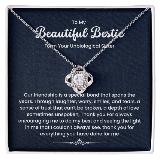 Love Knot Necklace for Bestie with heartfelt message, featuring cubic zirconia on a silver chain, symbolizes unbreakable bond.