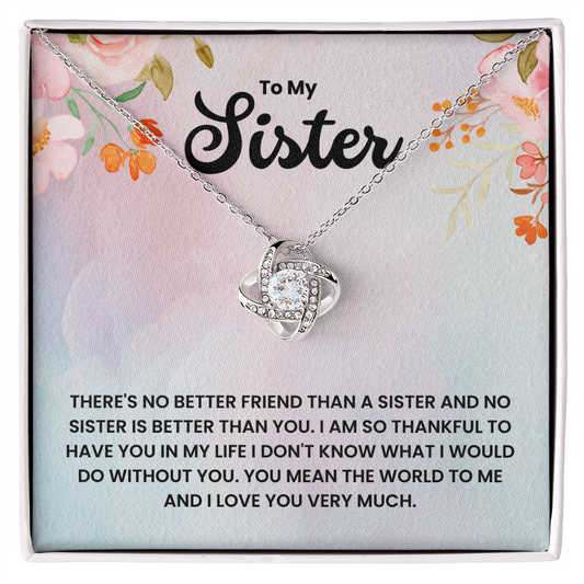 Love Knot Necklace for Sister with elegant cubic zirconia on a floral background, symbolizing unbreakable bond and affection.