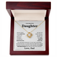 Golden love knot necklace with cubic zirconia in an open gift box, message 'To My Beautiful Daughter - Love, Dad' displayed inside.