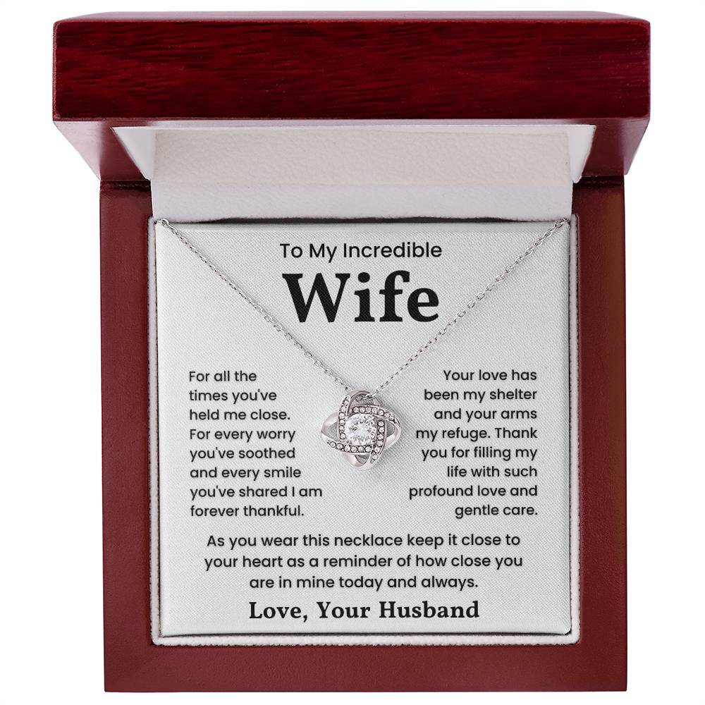 Love Knot Necklace gift for wife with heartfelt message in box, featuring cubic zirconia and choice of 14k or 18k gold over stainless steel.