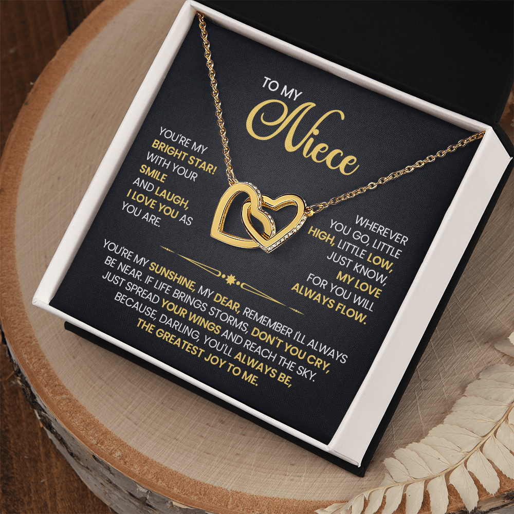 Interlocking Hearts Necklace in gift box with heartfelt message card, perfect gift from aunt or uncle to niece, rose gold and silver design.
