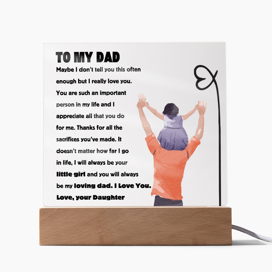Square acrylic plaque with heartfelt message 'To My Dad - You Will Always Be My Loving Dad' and illustration of daughter on dad's shoulders.