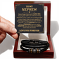 Love You Forever Nephew Bracelet with braided leather band and engraved message plate, presented in a gift box with heartfelt card.