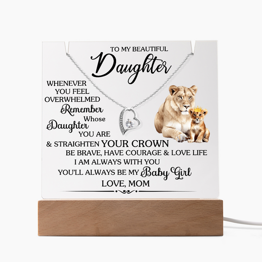 Square acrylic with 'To My Beautiful Daughter' message and Forever Love Necklace on a wooden stand, featuring a lion and cub illustration.
